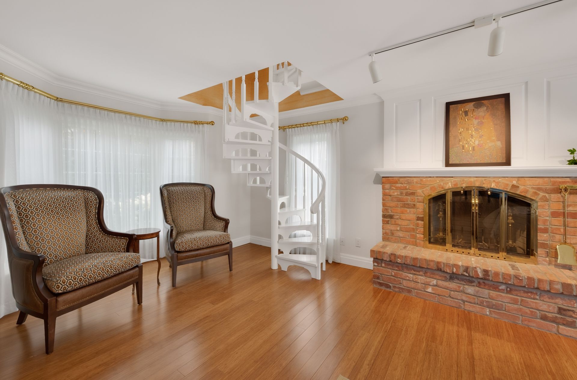 Living room with spiral staircase